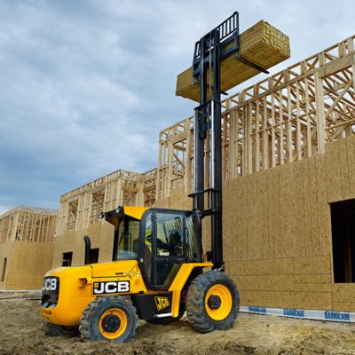 Forklift unloading machinery and industrial equipment in Crawley